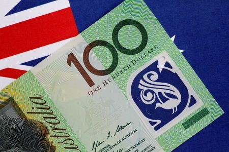 FILE PHOTO: An Australia dollar note is seen in this illustration photo June 1, 2017. REUTERS/Thomas White/Illustration FILE PHOTO: An Australia dollar note is seen in this illustration photo June 1, 2017. REUTERS/Thomas White/Illustration