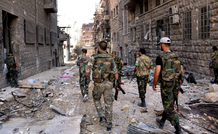 Сирийские войска ведут бои с мятежниками на севере и в центре страны