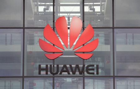 FILE PHOTO: Huawei logo is pictured on the headquarters building in Reading, Britain July 14, 2020. REUTERS/Matthew Childs/File Photo FILE PHOTO: Huawei logo is pictured on the headquarters building in Reading, Britain July 14, 2020. REUTERS/Matthew Childs/File Photo