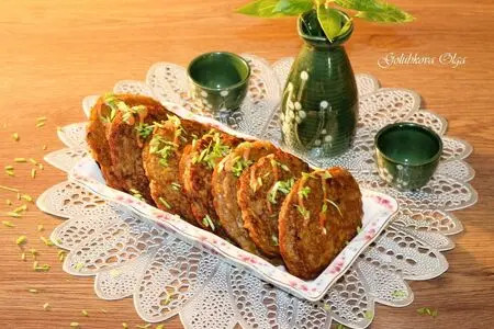Фото к рецепту: Филе индейки  в картофельной шубке