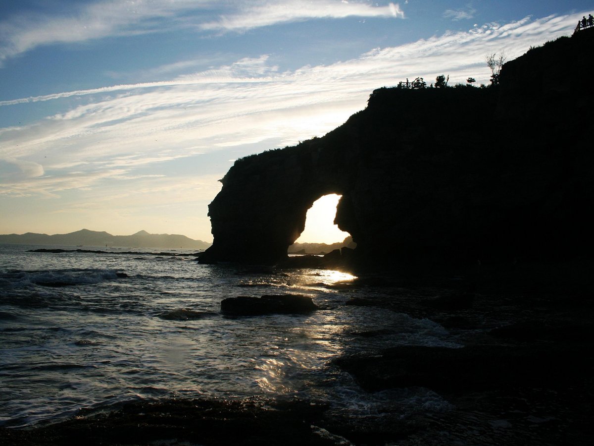 swim-with-the-animal-like-rock-structures-at-golden-pebble-beach-in-dalian