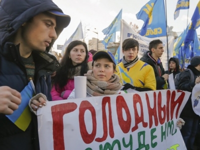 «Голодный студент – плохой специалист» - гласит плакат протестующих у Верховной Рады студентов против урезания средств на образование. Киев, 23 декабря 2014. 