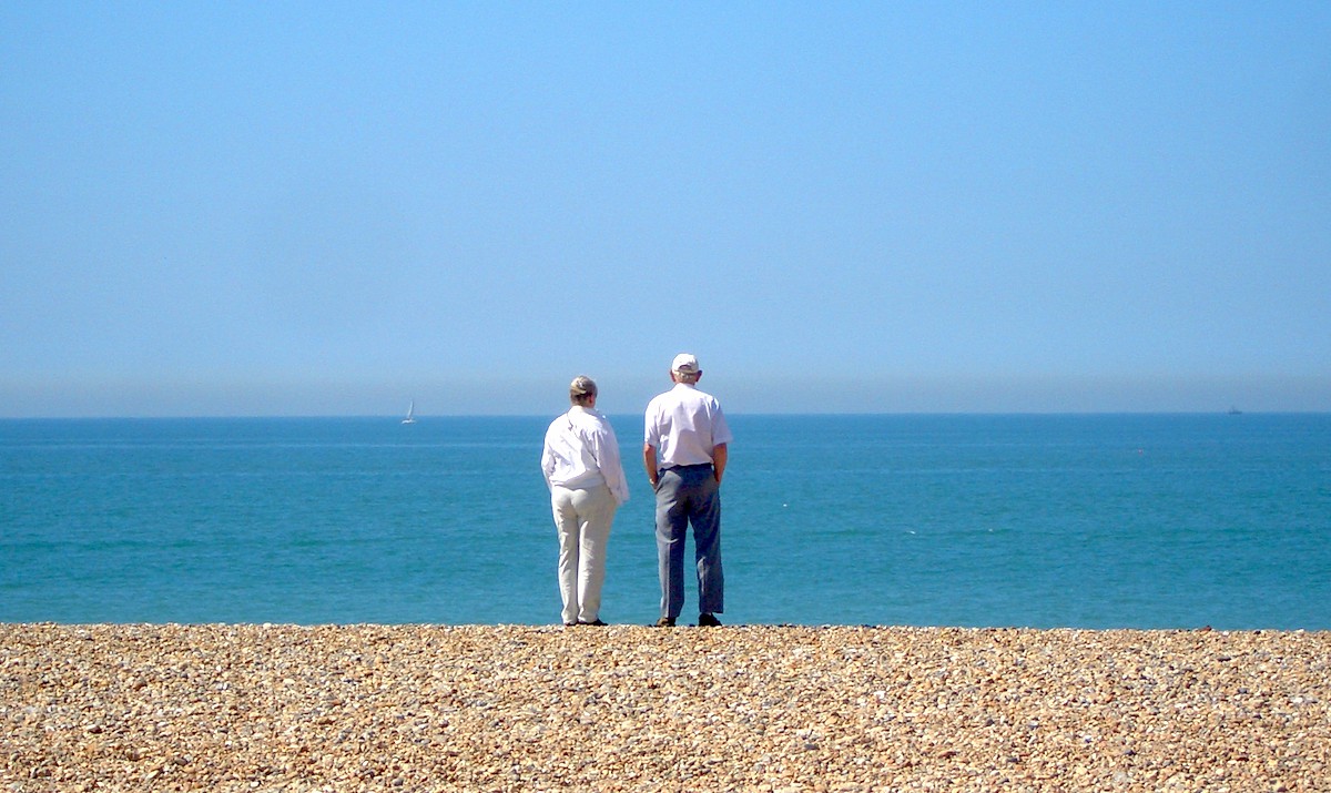 Elderly couple on the beach Elderly couple on the beach