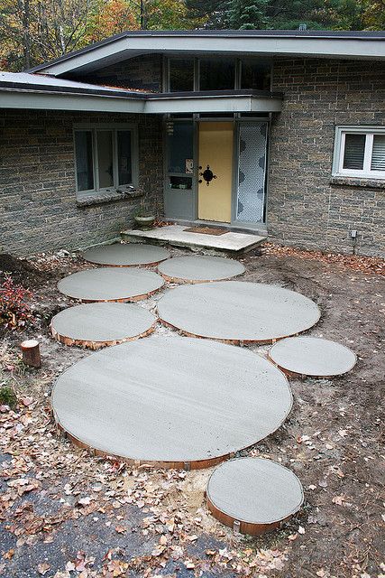 Large and small mod look concrete circle stepping stones for the backyard