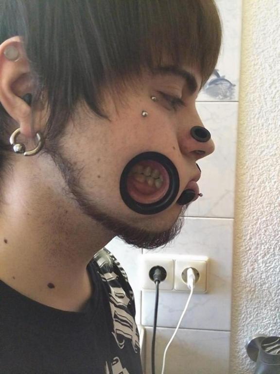 piercing and tunnels on the face