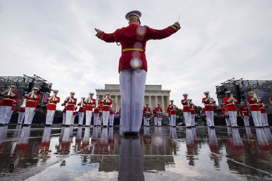 The U.S. Marine Corps Drum and Bugle Corps performs in the rain during an Independence Day, Thursday, July 4, 2019, in Washington. Alex Brandon, AP.… The U.S. Marine Corps Drum and Bugle Corps performs in the rain during an Independence Day, Thursday, July 4, 2019, in Washington. Alex Brandon, AP.…