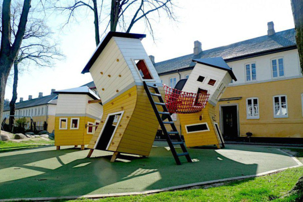 the-design-minds-at-monstrum-modeled-this-brumlebyen-area-playground-in-copenhagen-denmark-after-the-terraced-houses-that-populate-the-neighborhood-playhouses-feature-climbing-grips-slid