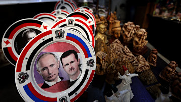 Сувенирная продукция с портретами Владимира Путина и Башара Асада Сувенирная продукция с портретами Владимира Путина и Башара Асада