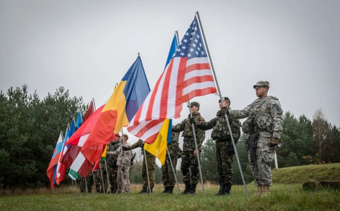 «Сигнал партии войны»: что значит присвоение Украине нового статуса в НАТО