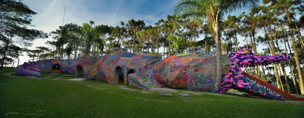 in-2012-poland-born-brooklyn-based-artist-olek-created-this-crocheted-alligator-installation-on-a-so-paulo-brazil-playground-designed-by-brazilian-architect-mrcia-maria-benevento