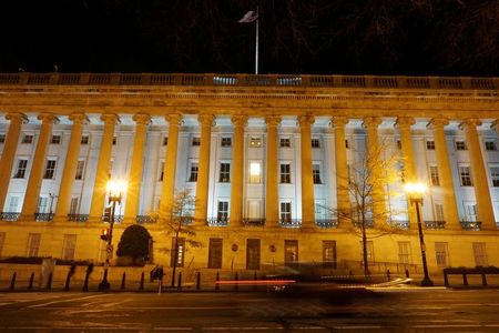 A vehicle drives past the U.S. Treasury Department in Washington, D.C., U.S. December 13, 2020. Picture taken with a long exposure. Picture taken December 13, 2020. REUTERS/Raphael Satter A vehicle drives past the U.S. Treasury Department in Washington, D.C., U.S. December 13, 2020. Picture taken with a long exposure. Picture taken December 13, 2020. REUTERS/Raphael Satter
