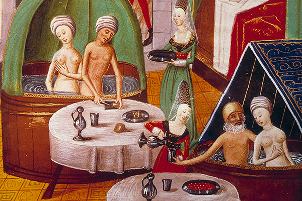 The Bathhouses - View of the Interior of a brothel, nude couples eating and drinking in bathtubs, another couple is in a bed. Miniature from "The Book of Valerius Maximus (Valere Maxime)", 15th century's manuscript, 5196 fol. 372. Arsenal Library, Paris, France --- Image by © Leemage/Corbis