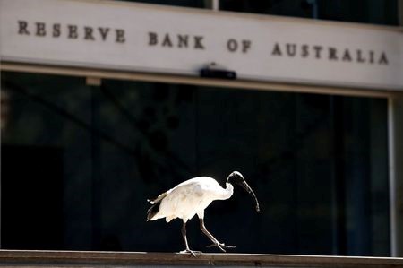 An ibis bird perches next to the Reserve Bank of Australia headquarters in central Sydney, Australia February 6, 2018. REUTERS/Daniel Munoz An ibis bird perches next to the Reserve Bank of Australia headquarters in central Sydney, Australia February 6, 2018. REUTERS/Daniel Munoz