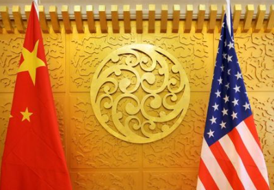 FILE PHOTO: Chinese and U.S. flags are set up for a meeting at China's Ministry of Transport in Beijing, China April 27, 2018. REUTERS/Jason Lee FILE PHOTO: Chinese and U.S. flags are set up for a meeting at China's Ministry of Transport in Beijing, China April 27, 2018. REUTERS/Jason Lee