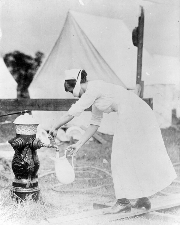 Nurse-wearing-a-mask-as-protection-against-influenza.-September-13-1918.jpg