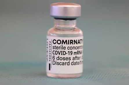 A vial of the "Comirnaty" Pfizer-BioNTech COVID-19 vaccine is seen as part of the coronavirus disease vaccination campaign in Antibes, France, March 29, 2021. REUTERS/Eric Gaillard A vial of the "Comirnaty" Pfizer-BioNTech COVID-19 vaccine is seen as part of the coronavirus disease vaccination campaign in Antibes, France, March 29, 2021. REUTERS/Eric Gaillard