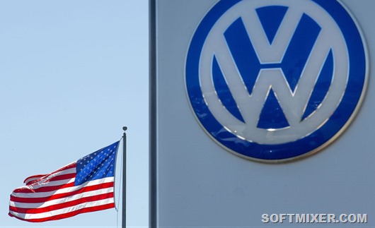 An_American_flag_flies_next_to_a_Volkswagen_car_dealership_in_Sa