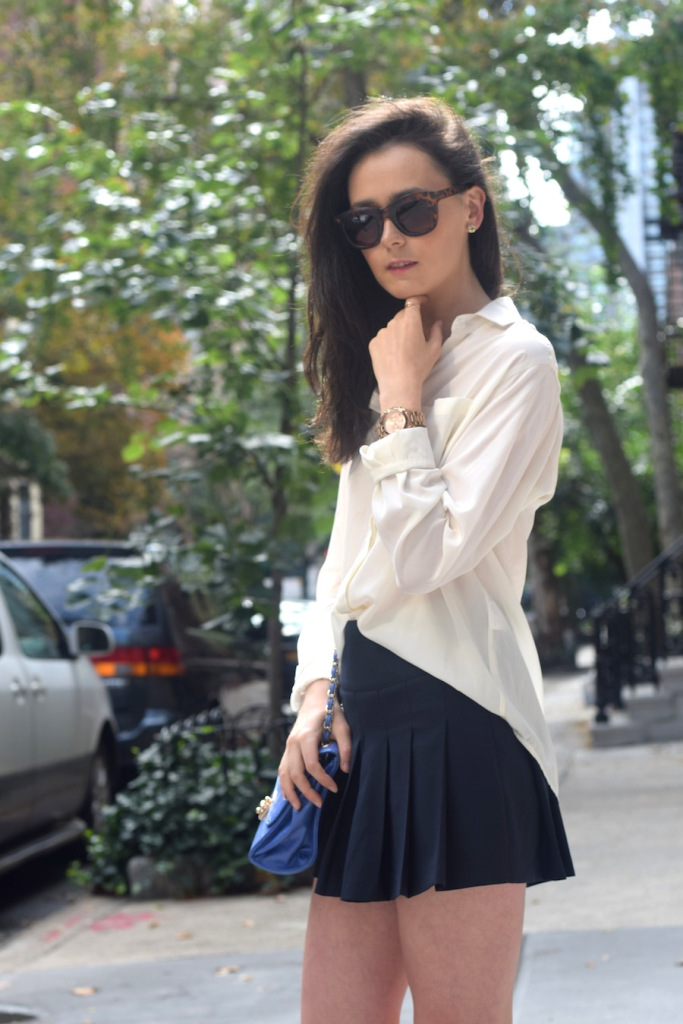 white shirt and pleated skirt