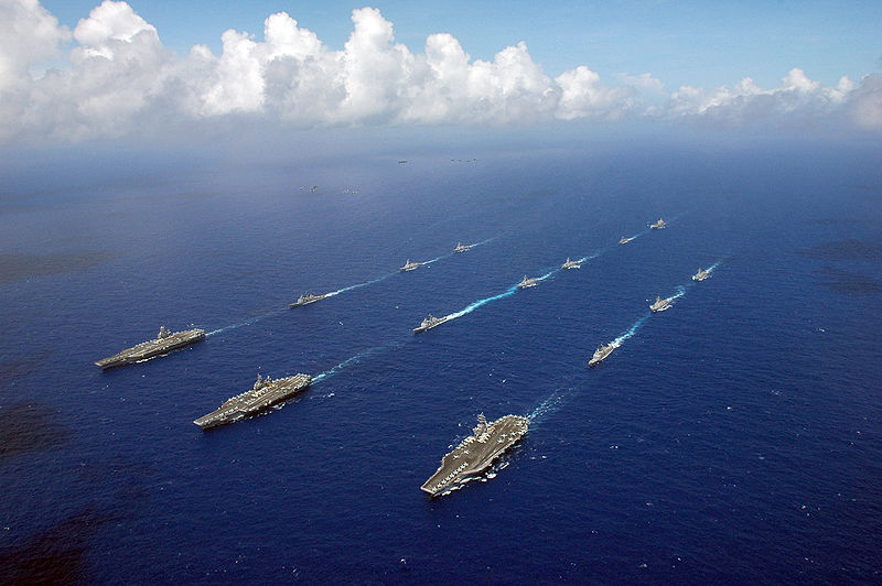 800px-US_Navy_060618-N-8492C-221_The_Kitty_Hawk,_Ronald_Reagan_and_Abraham_Lincoln_Carrier_Strike_groups_sail_in_formation