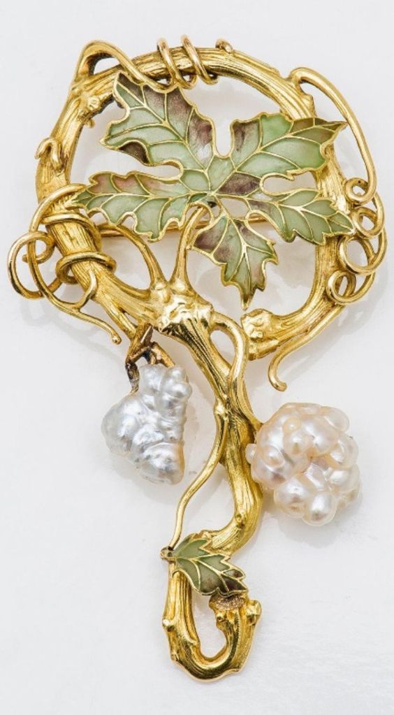 An Art Nouveau gold, translucent enamel and baroque pearl brooch, circa 1900. Length 7cm. #ArtNouveau #brooch