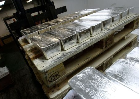 Bars of silver are placed on wooden pallets at the KGHM copper and precious metals smelter processing plant in Glogow May 10, 2013. Silver prices swung wildly in the wake of extreme losses seen in gold last month, but while investors fled bullion-backed funds in droves, holdings in the less glamorous precious metal are remarkably robust, for now. REUTERS/Peter Andrews (POLAND - Tags: BUSINESS COMMODITIES INDUSTRIAL) Bars of silver are placed on wooden pallets at the KGHM copper and precious metals smelter processing plant in Glogow May 10, 2013. Silver prices swung wildly in the wake of extreme losses seen in gold last month, but while investors fled bullion-backed funds in droves, holdings in the less glamorous precious metal are remarkably robust, for now. REUTERS/Peter Andrews (POLAND - Tags: BUSINESS COMMODITIES INDUSTRIAL)