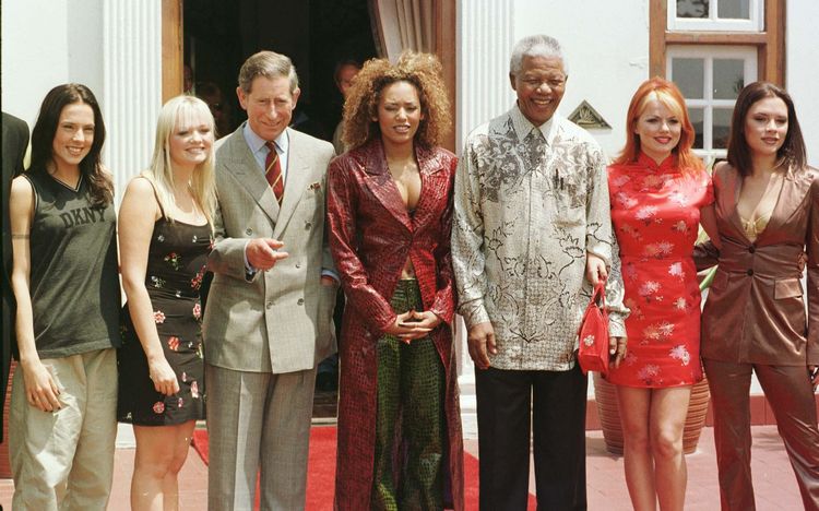 Примерно 400 девушек откликнулись на объявление и пришли на кастинг. В итоге были отобраны пять девушек. Первоначально группа называлась «Touch» и в её состав вошли Виктория Адамс, Мелани Браун, Мелани Чисхолм, Эмма Бантон и Джери Холливелл. 

На снимке: солистки Spice Girls, принц Уэльский и Нельсон Мандела, 1997 год. 
