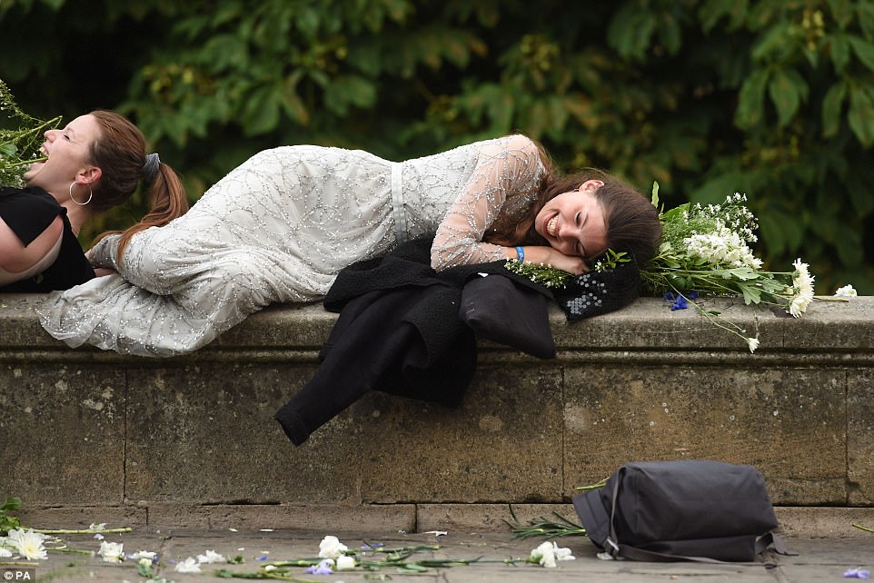 Sleeping beauty: After a hard night's partying, it's no surprise some students took a moment to lay their head down for a nap