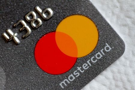 FILE PHOTO: A Mastercard logo is seen on a credit card in this picture illustration August 30, 2017. REUTERS/Thomas White/Illustration FILE PHOTO: A Mastercard logo is seen on a credit card in this picture illustration August 30, 2017. REUTERS/Thomas White/Illustration