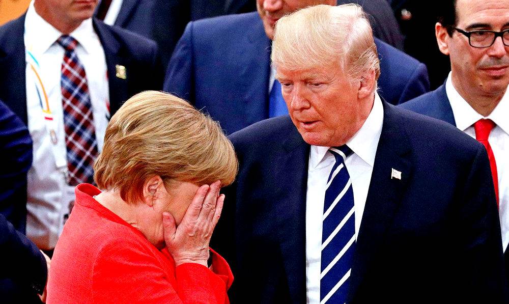 Международный скандал: Трамп со злости запустил в Меркель горсть конфет Международный скандал: Трамп со злости запустил в Меркель горсть конфет