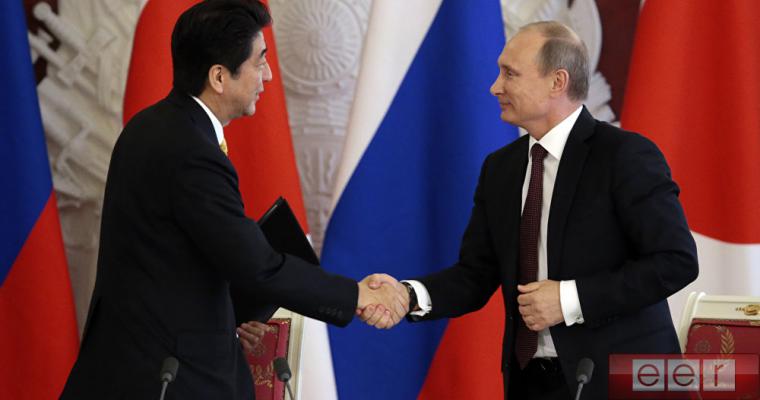 Синдзо Абэ и Владимир Путин Синдзо Абэ и Владимир Путин
