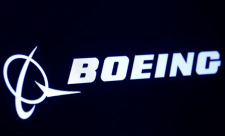 FILE PHOTO: The company logo for Boeing is displayed on a screen on the floor of the New York Stock Exchange (NYSE) in New York, U.S., March 11, 2019. REUTERS/Brendan McDermid/File Photo FILE PHOTO: The company logo for Boeing is displayed on a screen on the floor of the New York Stock Exchange (NYSE) in New York, U.S., March 11, 2019. REUTERS/Brendan McDermid/File Photo