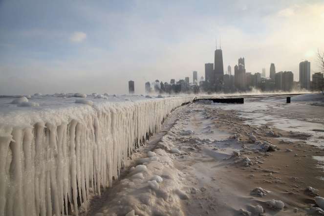 Ice builds up along Lake Michigan at North Avenue Beach as temperatures dipped well below zero on January 6, 2014.