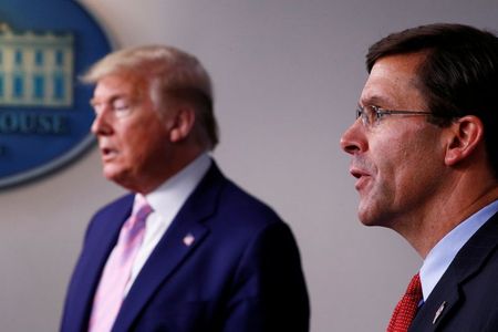 U.S. Defense Secretary Mark?Esper speaks about U.S. military moves against Venezuela as U.S. President Donald Trump listens during the daily coronavirus response briefing at the White House in Washington, U.S., April 1, 2020. REUTERS/Tom Brenner U.S. Defense Secretary Mark?Esper speaks about U.S. military moves against Venezuela as U.S. President Donald Trump listens during the daily coronavirus response briefing at the White House in Washington, U.S., April 1, 2020. REUTERS/Tom Brenner