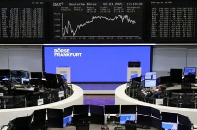 The German share price index DAX graph is pictured at the stock exchange in Frankfurt, Germany, March 2, 2021. REUTERS/Staff The German share price index DAX graph is pictured at the stock exchange in Frankfurt, Germany, March 2, 2021. REUTERS/Staff