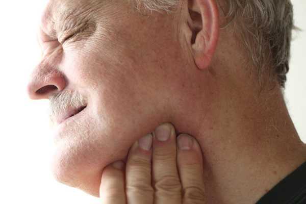 Боль в области челюсти: что делать
