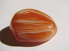 Carnelian - tumble polished stone.jpg