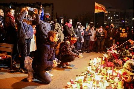 People gather to mourn the death of anti-government protester Roman Bondarenko who they say was beaten by Belarusian security forces in Minsk, Belarus November 12, 2020. BelaPAN via REUTERS People gather to mourn the death of anti-government protester Roman Bondarenko who they say was beaten by Belarusian security forces in Minsk, Belarus November 12, 2020. BelaPAN via REUTERS