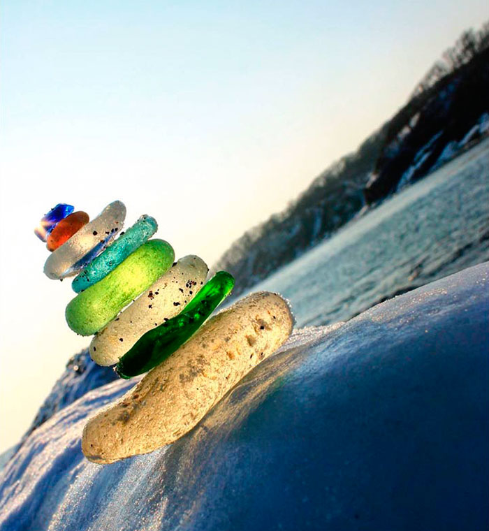 vodka-bottle-pebbles-glass-beach-ussuri-bay-russia-5