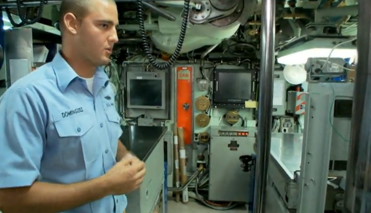 close-to-the-comm-area-is-the-navigation-section-of-the-submarine-where-the-quarter-master-keeps-watch