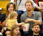Prince Harry watches seated volleyball with British Paralympian Dave Henson, his wife Hayley Henson, and their two-year-old daughter Emily from the stands during the Invictus Games at the Mattamy Athletics centre Invictus Games, Toronto, Canada - 27 Sep 2017
