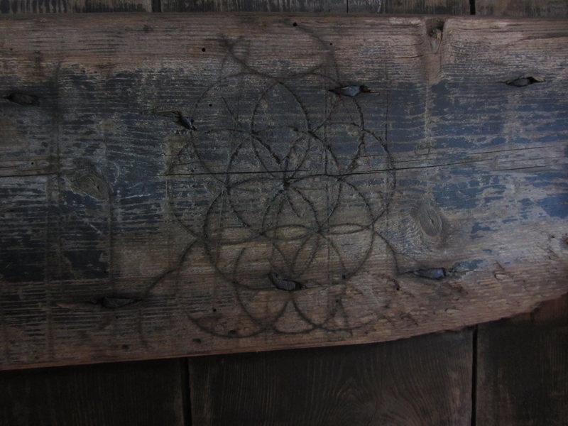 A cluster of integrated circles found on a 19th-century barn door close to Laxfield in Suffolk, England.