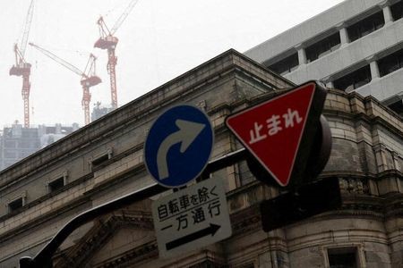 Traffic signs are seen in front of the headquarters of Bank of Japan amid the coronavirus disease (COVID-19) outbreak in Tokyo, Japan, May 22, 2020.REUTERS/Kim Kyung-Hoon Traffic signs are seen in front of the headquarters of Bank of Japan amid the coronavirus disease (COVID-19) outbreak in Tokyo, Japan, May 22, 2020.REUTERS/Kim Kyung-Hoon