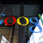 ** FILE ** The logo of Google, seen on the front door of the new Google Engineering center in Zurich, Switzerland, in this March 6, 2008 file photo. Google Inc. on Tuesday, March 11, 2008 said it has taken control of online ad service DoubleClick Inc., completing a deal that the Internet search leader announced 11 months ago. (AP Photo/Keystone, Walter Bier, file)