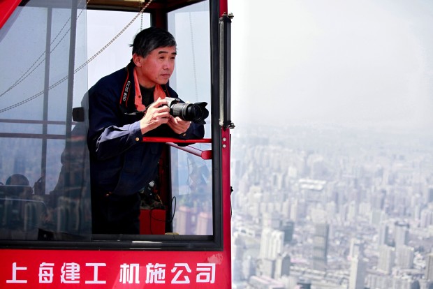 Crane operator wins photo competition prize for aerial photos taken from his crane, Shanghai, China - 26 Nov 2013