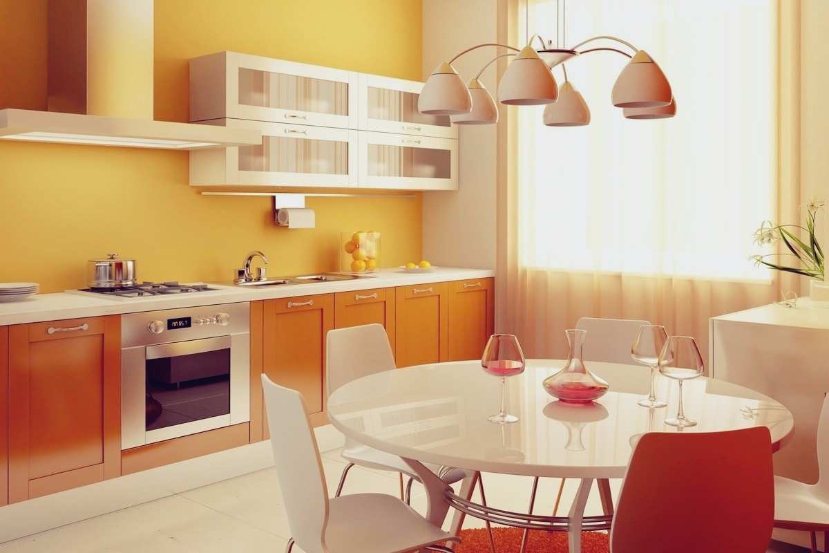 Теплые оттенки оранжевого цвета создают в интерьере кухни спокойную и уютную атмосферу