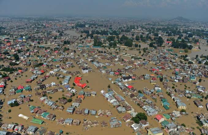 Kashmiri houseboats and houses submerged by floodwater are seen from an Indian Air Force helicopter during rescue and relief operations in Dal Lake in Srinagar on September 10, 2014.