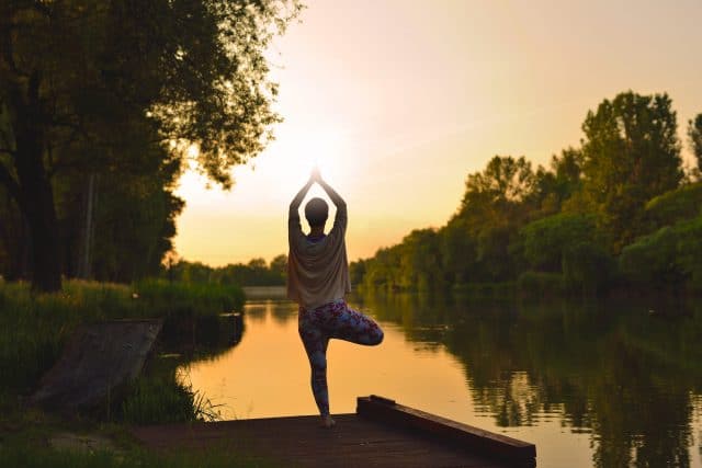 Young woman practising yoga