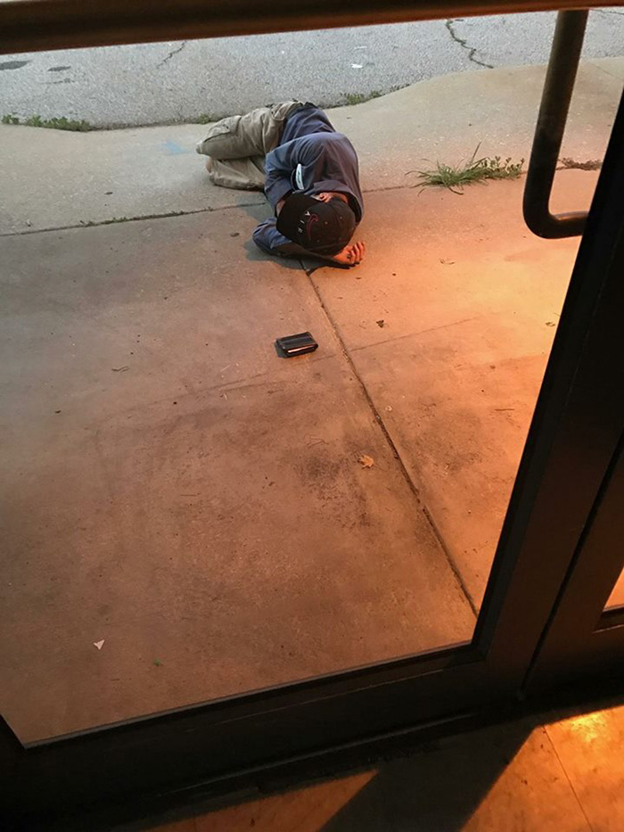 homeless man sleeping at shelter for lost dog
