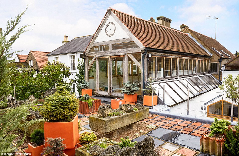 Part of the building was used as a boat repair shop up until the 1930s. The house is now split over two floors with an open-plan feel, working the original chapel fittings into the design, keeping the vaulted ceilings and original beams