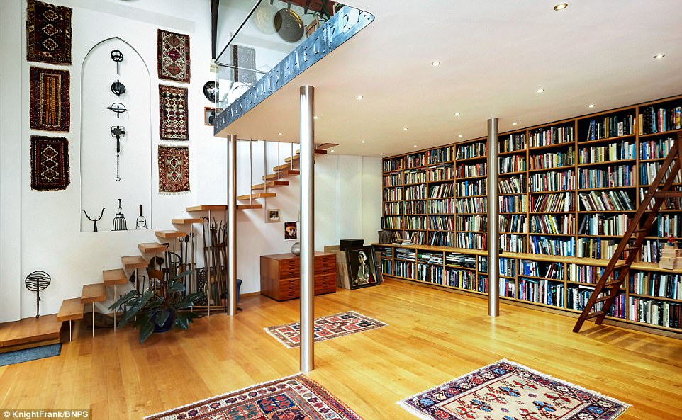 The stunning property now boasts a library room and there is a nod to its holy past. There is a Latin inscription around the edge of the mezzanine floor which translates to 'this house has been rendered more beautiful by the presence of a dove'